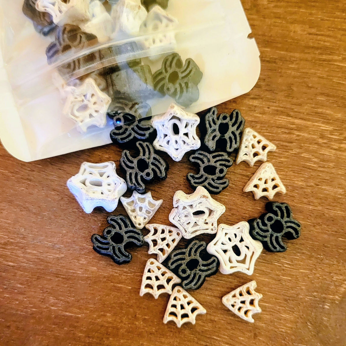 Black Spiders and White Spider Webs